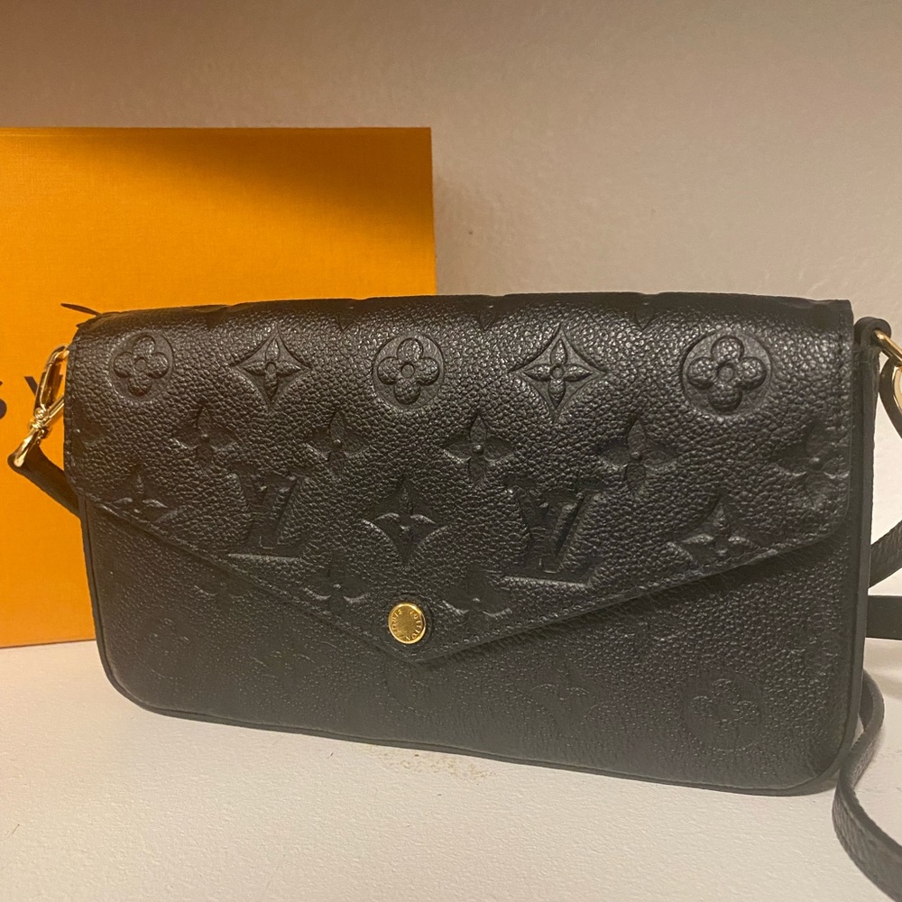 Louis Vuitton Felicie Pochette Monogram Empreinte leather black purse.